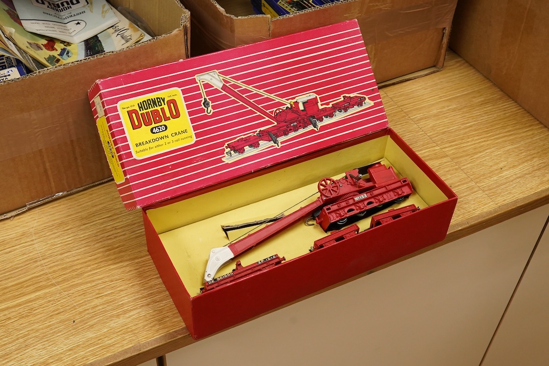 A collection of Hornby Dublo railway for 3-rail running, including three boxed locomotives; an LNER class A4 4-6-2 tender locomotive, Sir Nigel Gresley 7 (EDL1), a BR Duchess of Montrose 46232 (EDL12), and a BR class N2